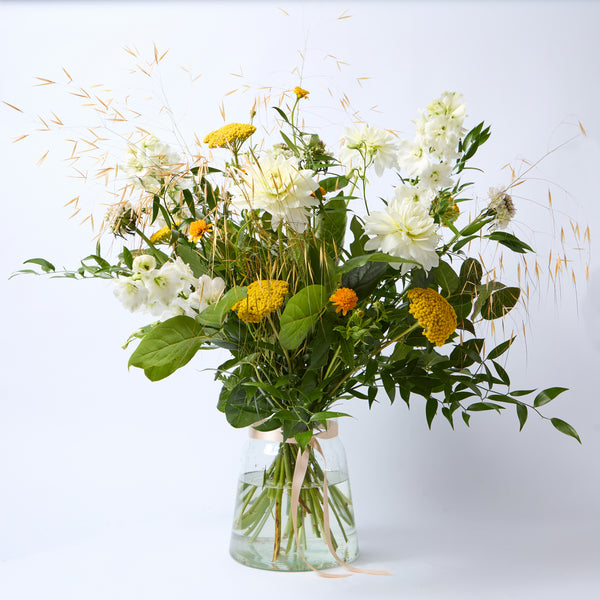Champagne Supernova (White delphinium / Dahlia / Achillea / Heliopsis / Grasses / Soft ruscus)